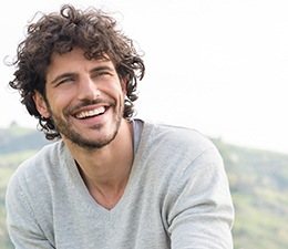 A happy and laughing young man