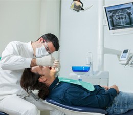 Waterbury implant dentist placing a dental implant