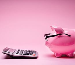 Piggy bank and calculator