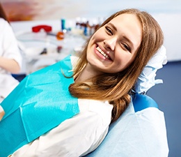 a woman smiling after root canal therapy in Waterbury