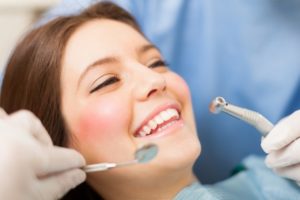 Woman smiling at dental appointment