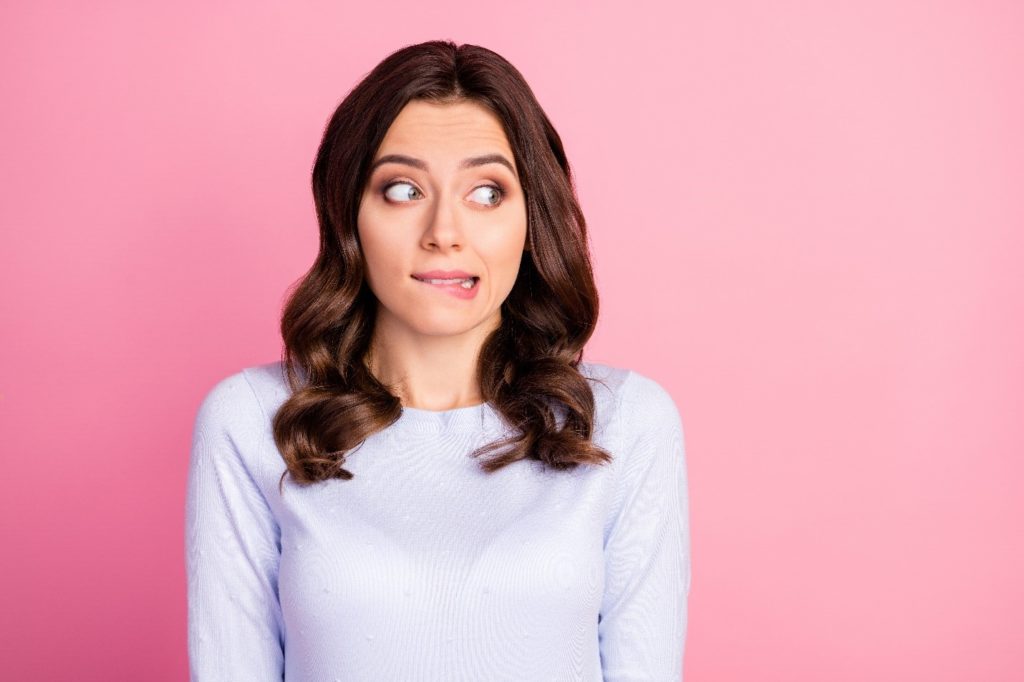 Closeup of nervous woman