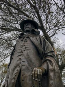 Statue of pilgrim in park