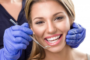 a patient visiting their dentist for cosmetic dentistry